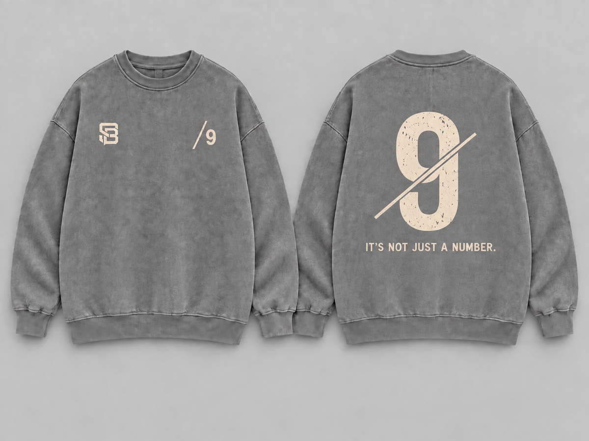Front and back views of grey washed oversized sweatshirt with number 9 graphic