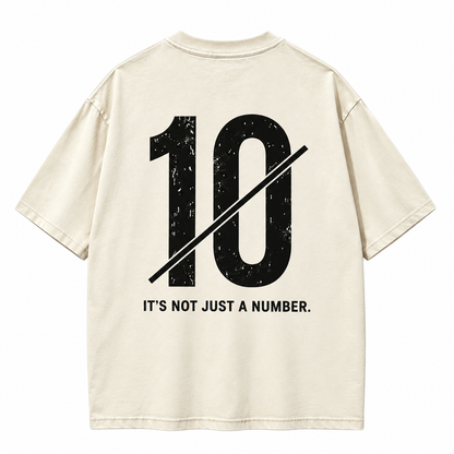 Back view of off-white oversized T-shirt with large number 10 and It’s Not Just a Number lettering