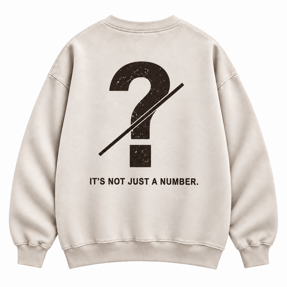 Close-up of customizable question mark graphic on the back of a cream oversized crewneck sweatshirt