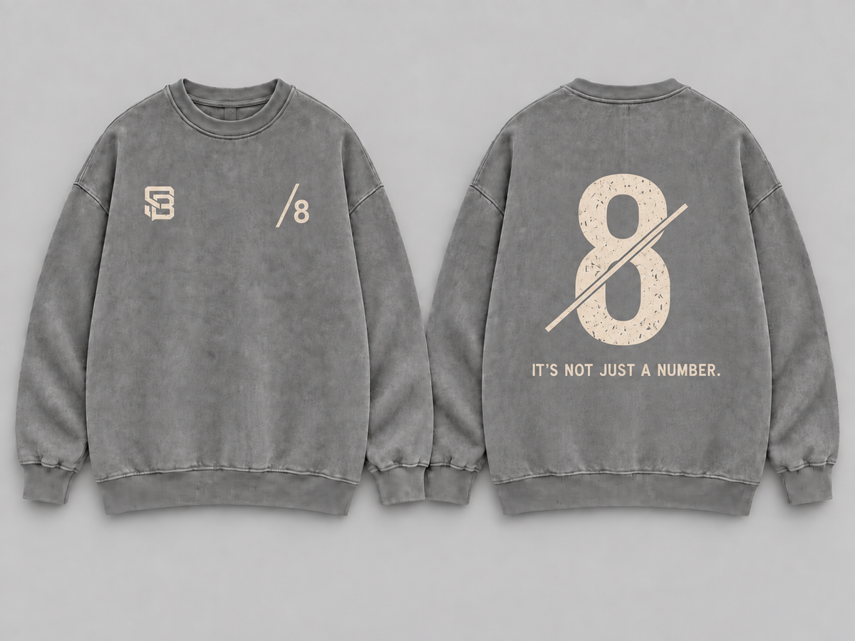 Front and back views of grey washed oversized sweatshirt with number 8 graphic