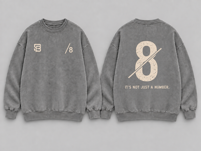 Front and back views of grey washed oversized sweatshirt with number 8 graphic