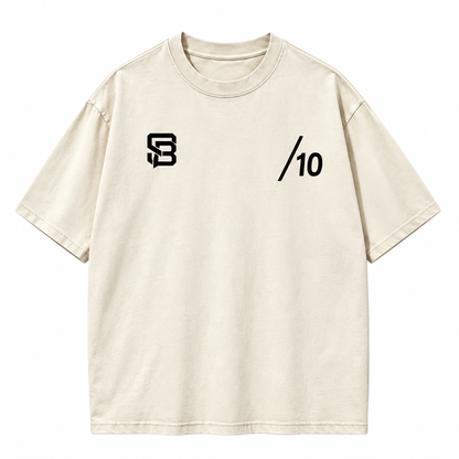 Front view of off-white oversized T-shirt with small chest graphics