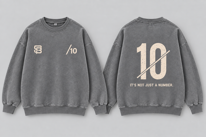 Front and back views of grey washed oversized sweatshirt with number 10 graphic