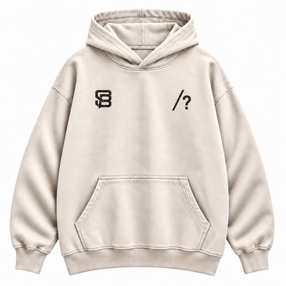Close-up of customizable question mark graphic on the front of a cream oversized hoodie