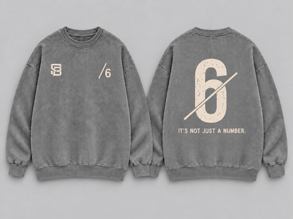 Front and back views of grey washed oversized sweatshirt with number 6 graphic