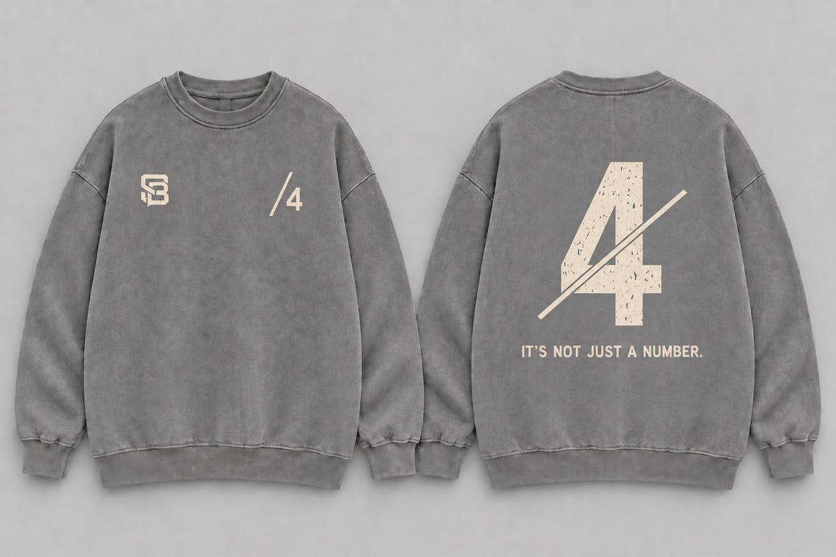 Front and back views of grey washed oversized sweatshirt with number 4 graphic