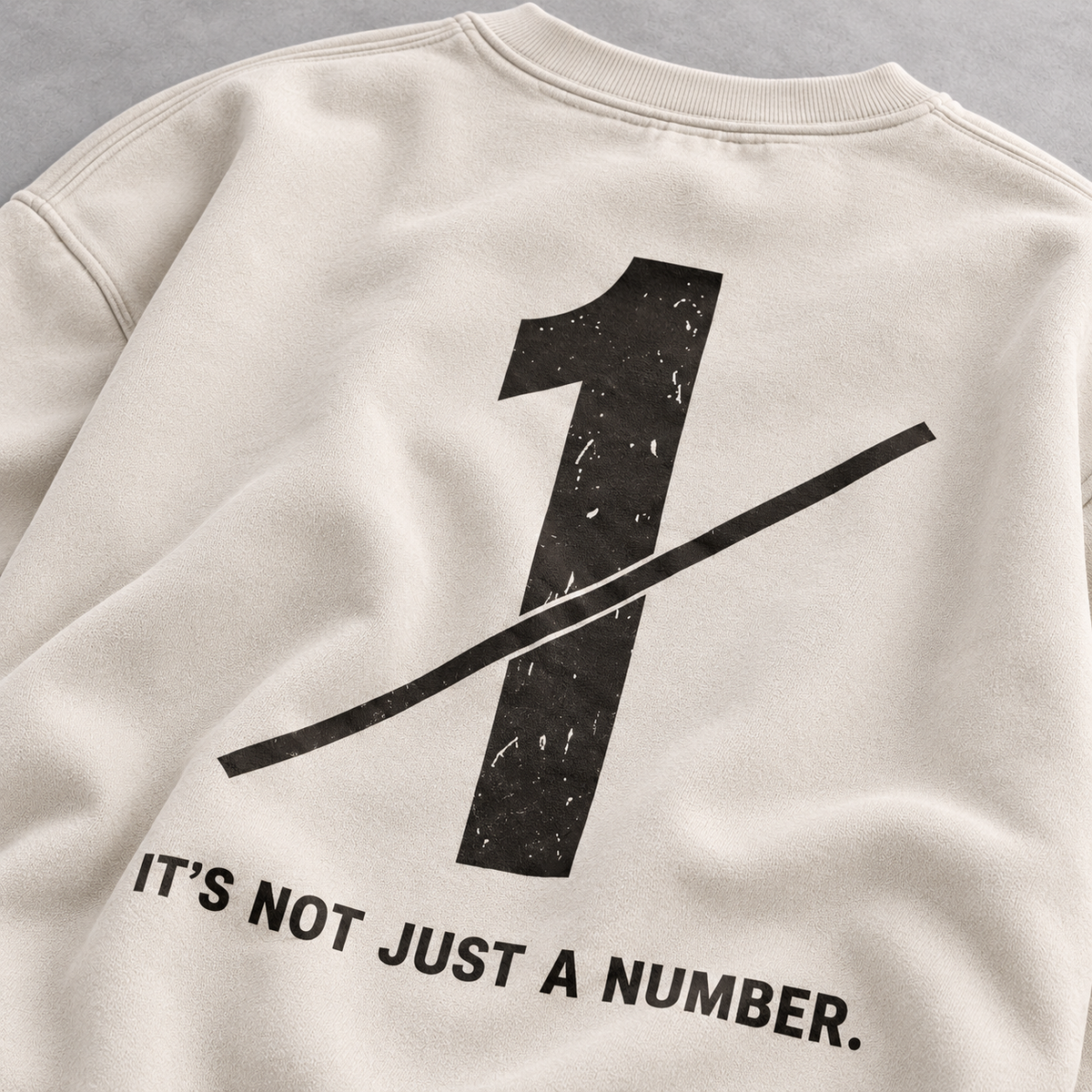 Close-up of the number 1 graphic on the back of oversized sweatshirt