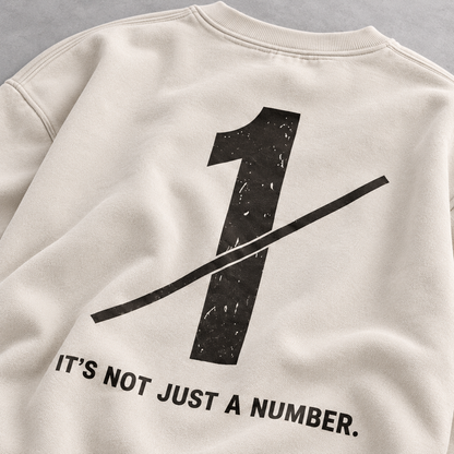 Close-up of the number 1 graphic on the back of oversized sweatshirt