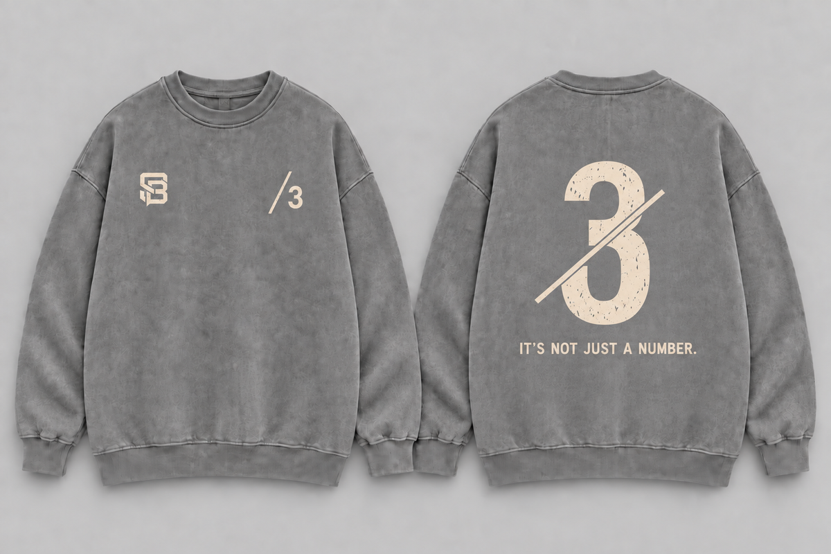 Front and back views of grey washed oversized sweatshirt with number 3 graphic
