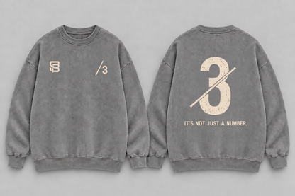 Front and back views of grey washed oversized sweatshirt with number 3 graphic